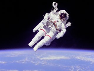 Astronaut floating in space
